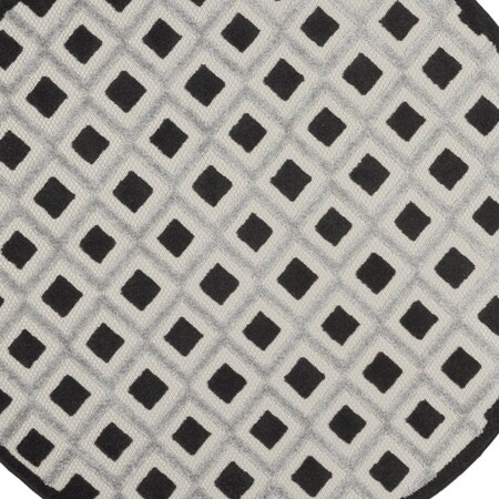 Homeroots 4' Black And White Round Geometric Indoor Outdoor Area Rug 546858
