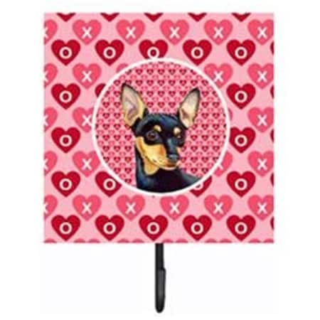 Carolines Treasures 4.25 x 7 in. Min Pin Valentines Love and Hearts Leash Or Key Holder LH9155SH4