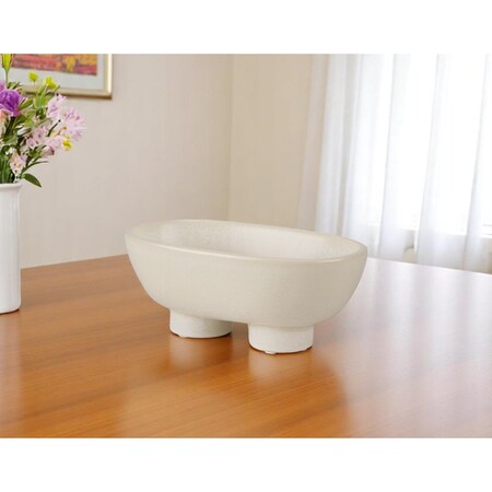 Homeroots 8" Cream Ceramic Oval Pedestal Centerpiece Bowl 609343