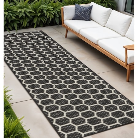 Homeroots 10' Black And Ivory Geometric Indoor Outdoor Runner Rug 564056