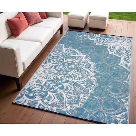 Homeroots 4' X 6' Teal Blue Floral Machine Braided Distressed Area Rug With UV Protection 555571