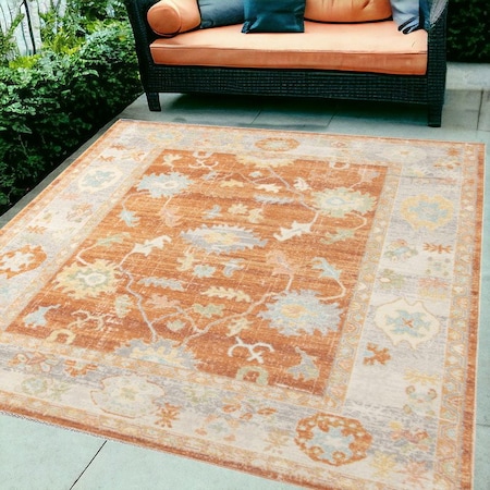 Homeroots 5' X 7' Blue and Orange Floral Stain Resistant Indoor Outdoor Area Rug 531501