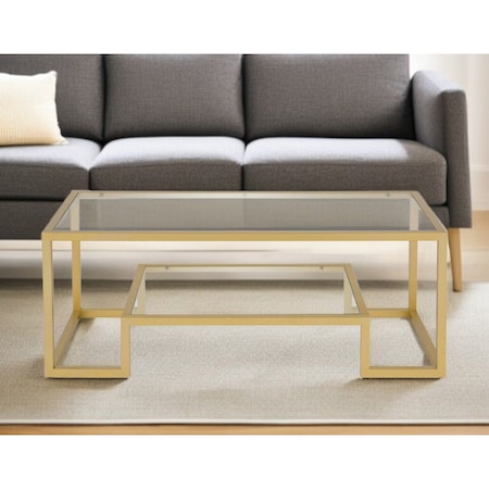 Homeroots 45" Clear And Gold Glass And Steel Sled Coffee Table With Shelf 520965