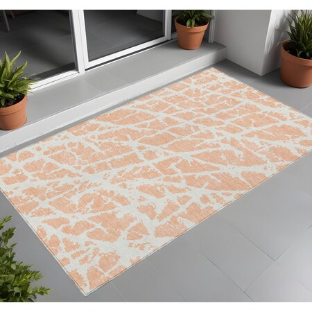 Homeroots 2' X 3' Peach and Ivory Abstract Washable Non Skid Indoor Outdoor Area Rug 559289