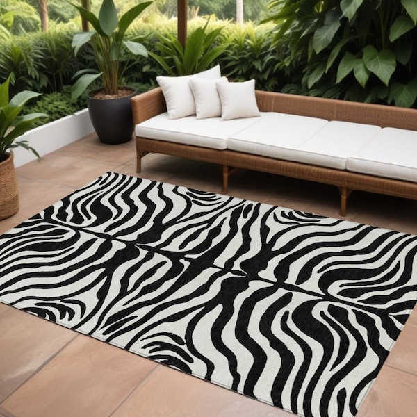 Homeroots 9' X 12' Black And Ivory Animal Print Washable Indoor Outdoor Area Rug 600592 - main