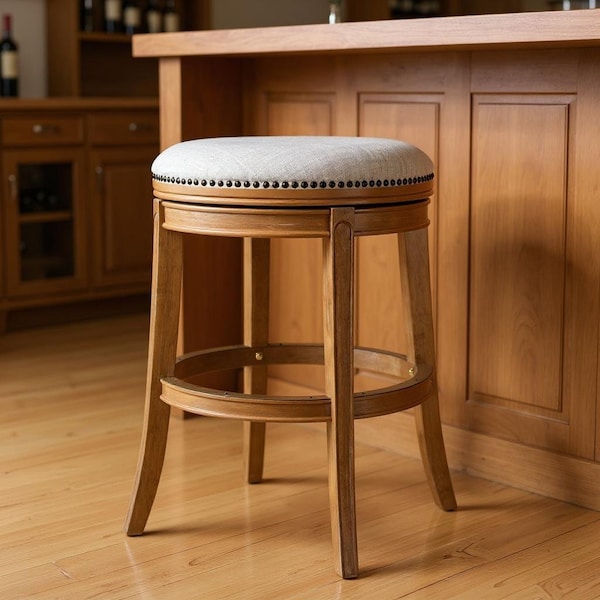 Homeroots 30" Sand and Oak Fabric and Solid Wood Backless Bar Height Swivel Bar Chair 632386 - main