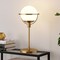 Homeroots 21" Brass Metal Globe Table Lamp With Clear Globe Shade 524379 - alternate 2