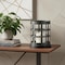 Homeroots 8" Black Distressed Lattice Metal And Glass Tabletop Hurricane Candle Holder 608383 - alternate 2