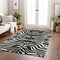 Homeroots 5' X 8' Black And Ivory Animal Print Washable Indoor Outdoor Area Rug 600589 - alternate 3