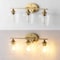 Jonathan Y Jayne 23" 3-Light Iron/Glass Cottage Rustic LED Vanity Light, Brass Gold JYL7547B - alternate 3