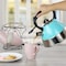 Mr. Coffee 2.5 Quart Stainless Steel Whistling Tea Kettle in Turquoise 128614.01 - alternate 3