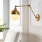 Jonathan Y Alba 8" 1-Light Modern Industrial Adjustable Swing Arm Metal Frosted Glass Globe LED Sconce, Brass Go JYL9931A - alternate 4