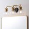 Jonathan Y Shirley 24" 3-light Farmhouse Industrial Metal LED Vanity Light w/Seeded Glass Globe Shades, Brass Go JYL7405B - alternate 6
