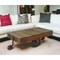 Homeroots 50" Brown and Black Solid Wood and Iron Distressed Wheel Coffee Table 488845 - alternate 4