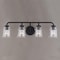 Vaxcel Toledo 4 Light Black Industrial Bathroom Vanity Fixture Clear Glass W0351 - alternate 5
