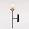 Vaxcel Orbit 1 Light Brass and Oil Rubbed Bronze Industrial MCM Wall Sconce Clear Glass Globe W0395 - alternate 8