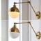 Jonathan Y Alba 8" 1-Light Modern Industrial Adjustable Swing Arm Metal Frosted Glass Globe LED Sconce, Brass Go JYL9931A - alternate 6