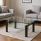 Homeroots 39" Clear and Black Glass and Steel Coffee Table With Shelf 635696 - alternate 1
