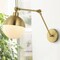 Jonathan Y Alba 8" 1-Light Modern Industrial Adjustable Swing Arm Metal Frosted Glass Globe LED Sconce, Brass Go JYL9931A - alternate 9