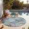 Homeroots 8' Round Teal Round Abstract Washable Non Skid Indoor Outdoor Area Rug 559537 - alternate 8